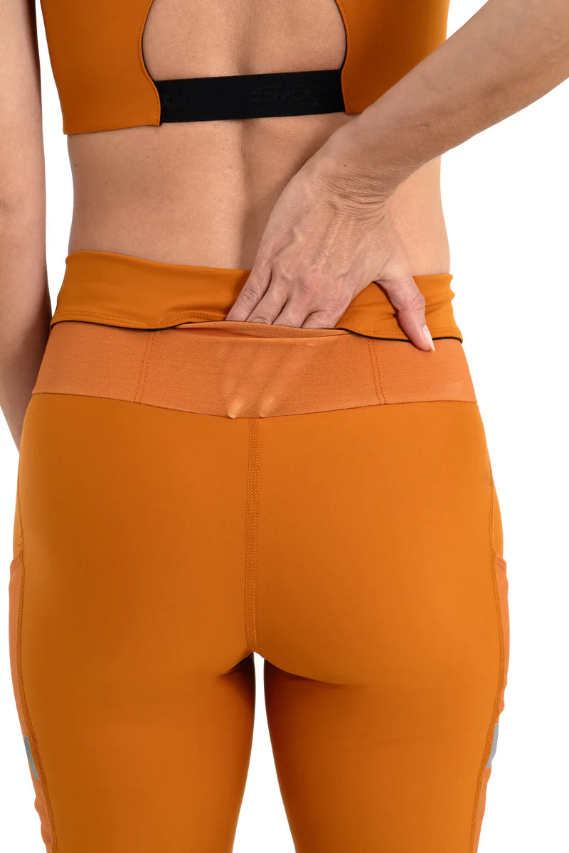 PANTALONETA SAFETTI MUJER RUNNING TITAN CARROT